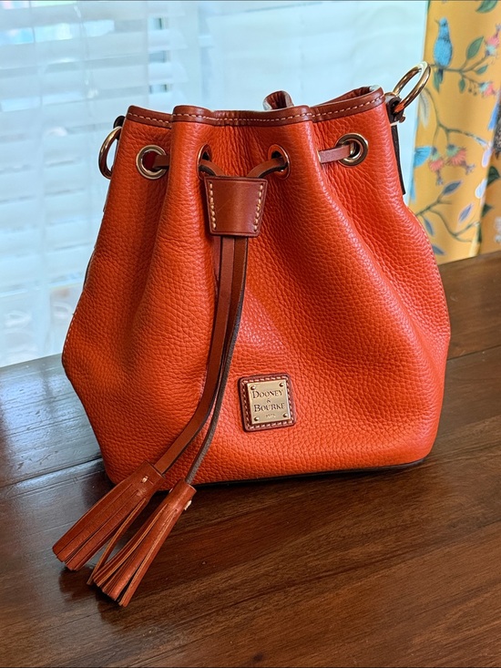 Dooney & Bourke Handbags - Dooney & Bourke Orange Pebbled Leather Drawstring Shoulder Bag